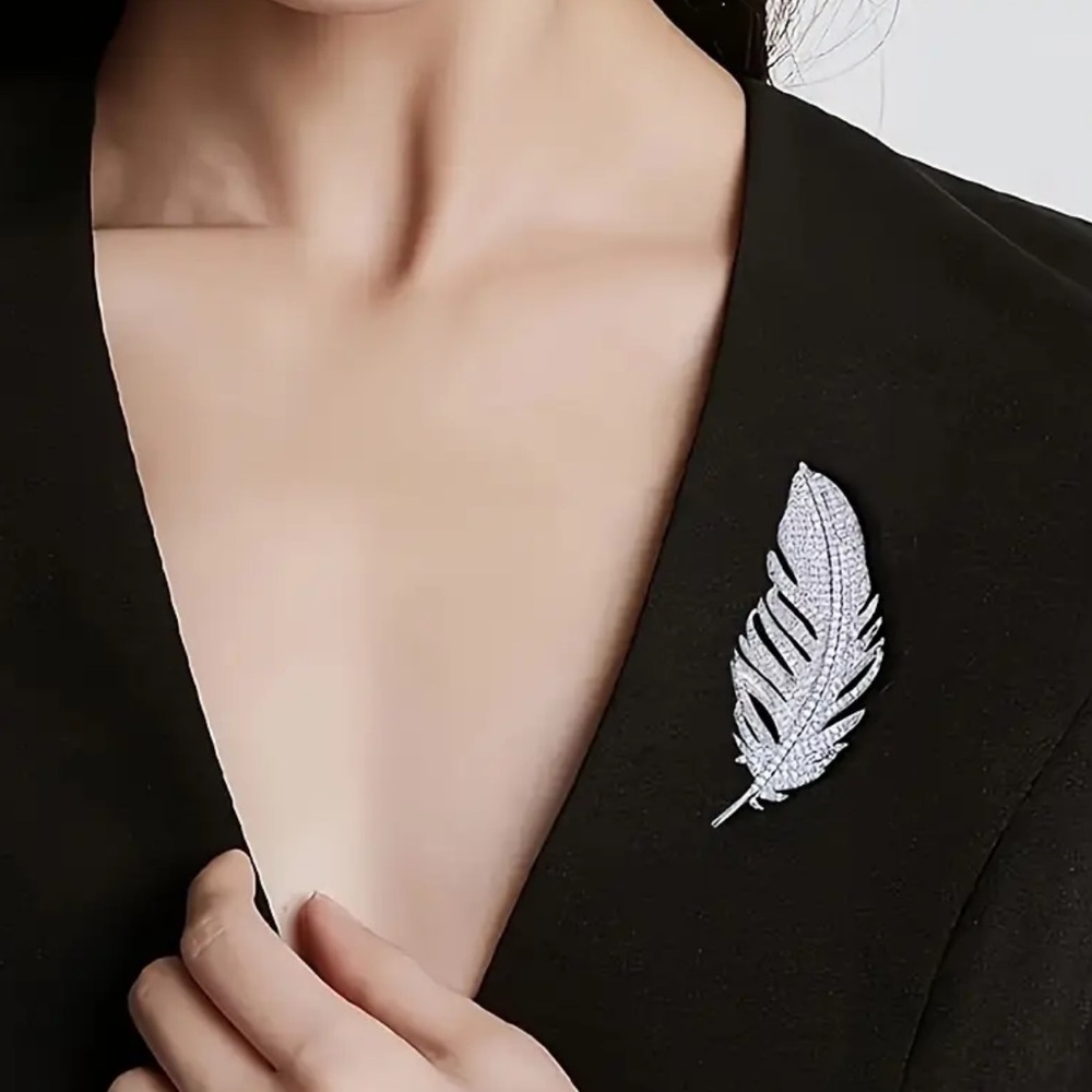 Elegant Silver Feather Brooch